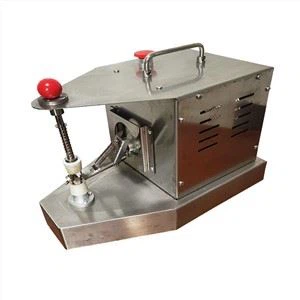 Appelsiinin kuorintakone